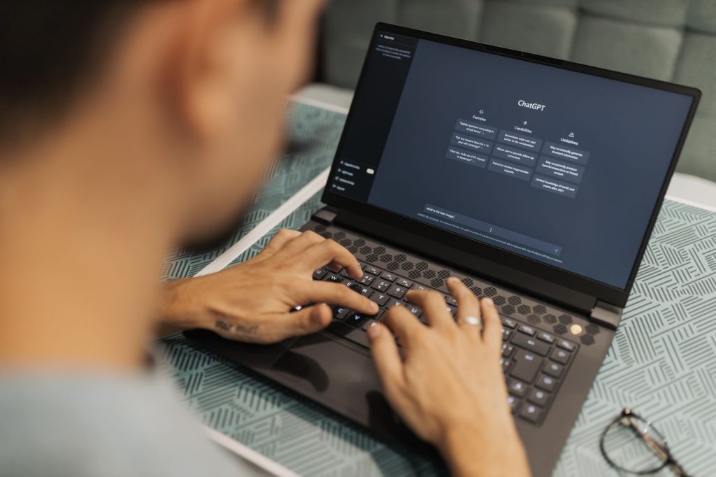A software architect evaluating complex cloud and AI integration systems on a monitor.