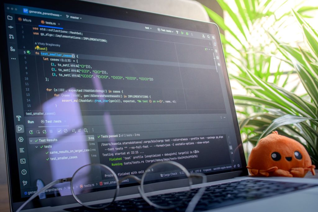 Developer investigates repository findings, updates code, and reviews test results.