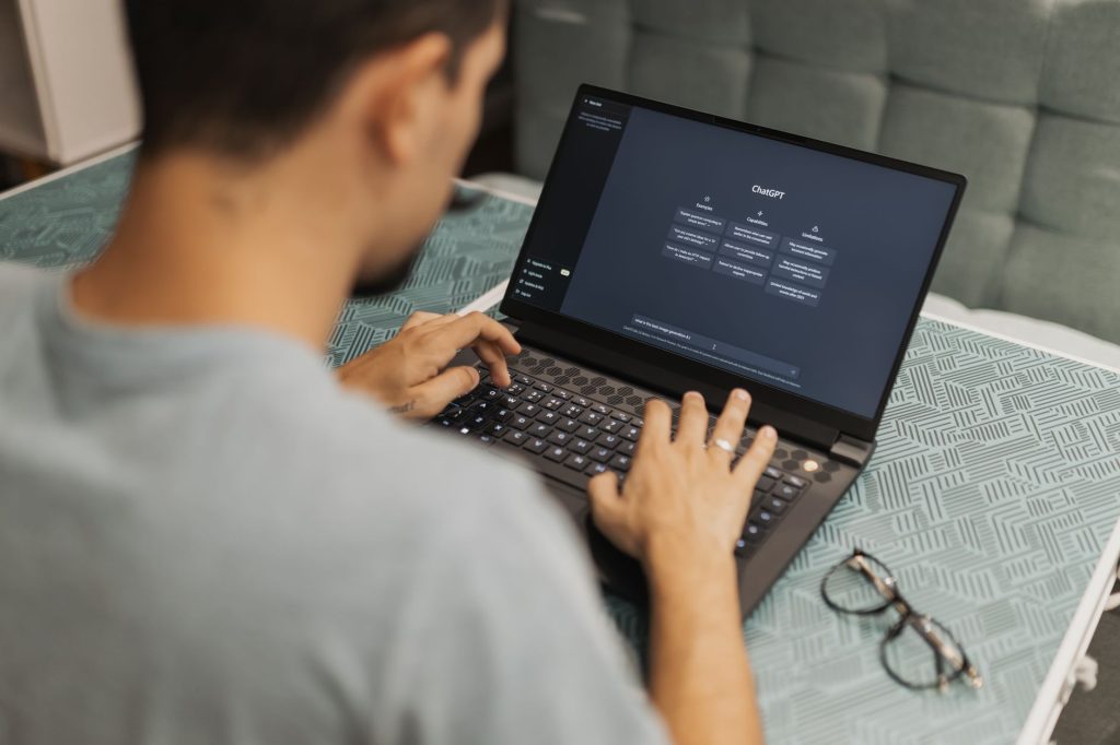 A worker checks an AI-generated draft, applying judgment and oversight.